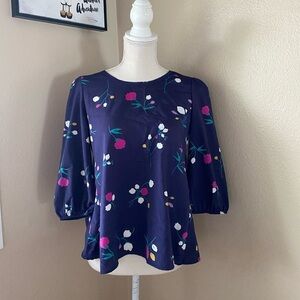 Kaitlyn blue floral 3/4 sleeve blouse with tulip hem (back), Sz. S